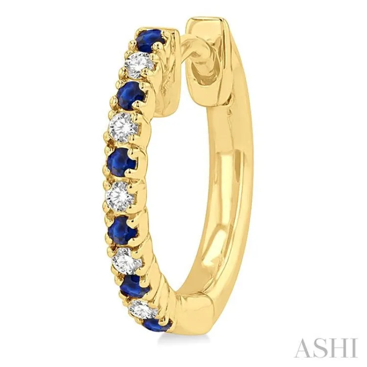 1/10 ctw Petite 1.35MM Sapphire and Round Cut Diamond Precious Fashion Huggies in 10K Yellow Gold