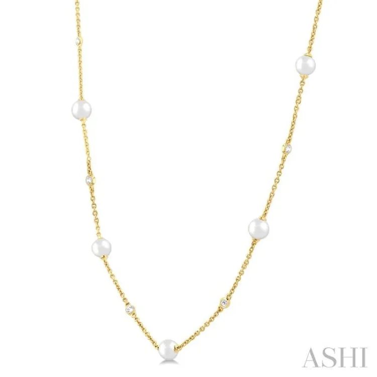 1/6 Ctw 4 MM Cultured Pearl and Round Cut Diamond Station Necklace in 14K Yellow Gold