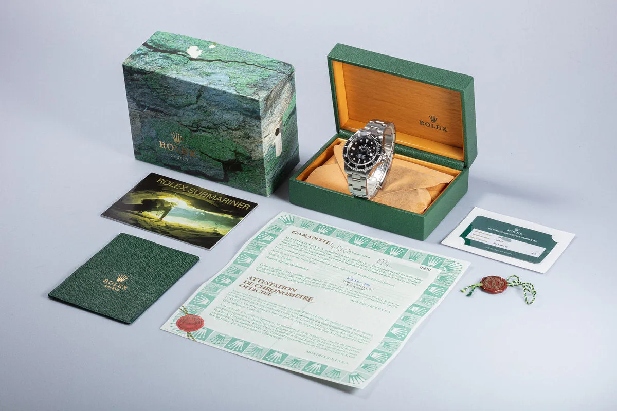 1999 Rolex Submariner 16610 with Box & Papers "Swiss Only" Dial Box, Papers & Service Card