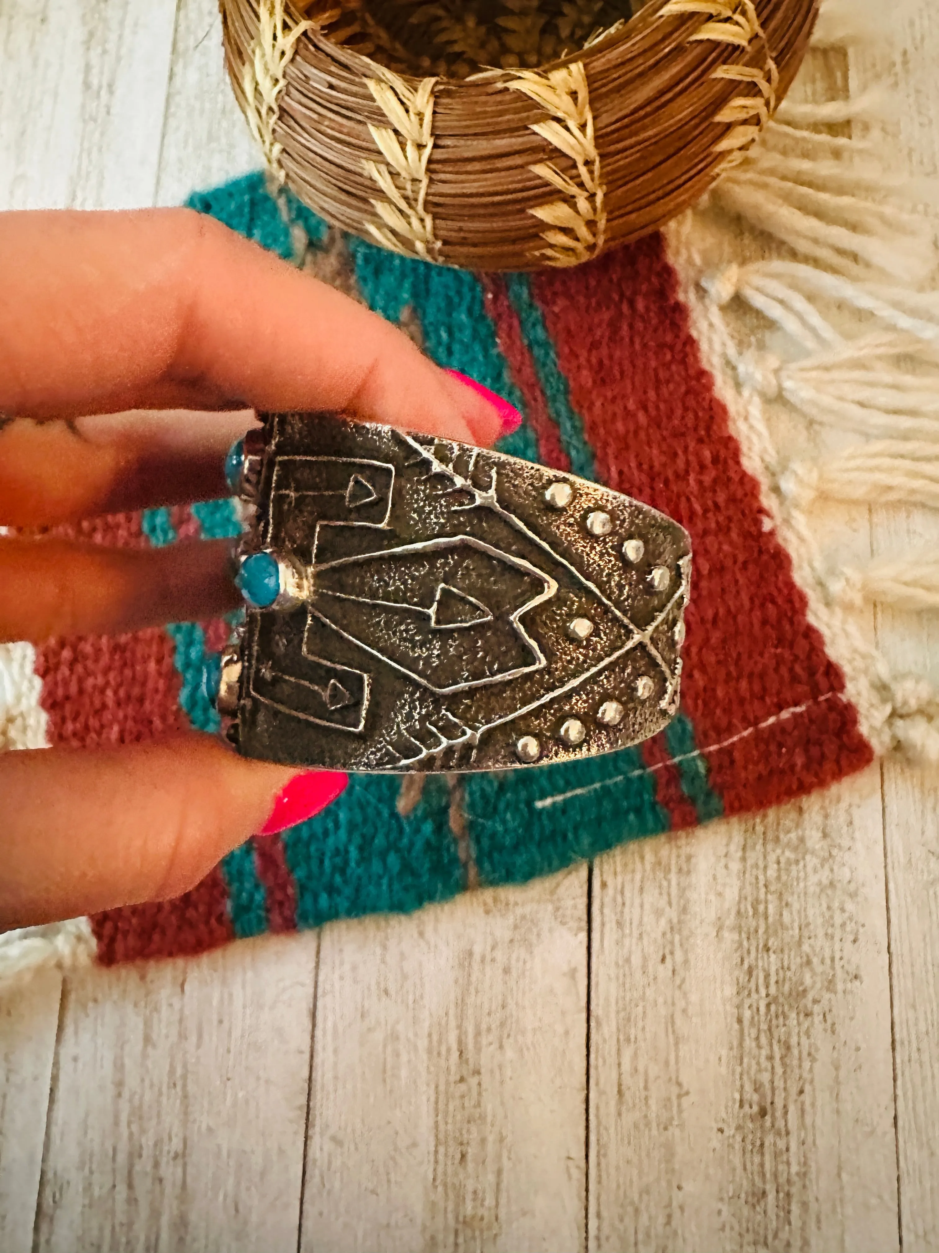 Navajo Turquoise & Sterling Silver Thunderbird Tufa Cast Cuff Bracelet by Delbert Arviso